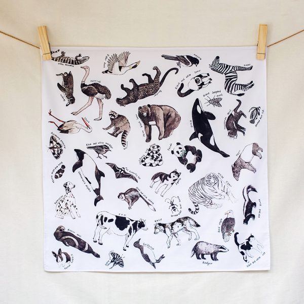 Inky and ivory animal kingdom – hand-illustrated organic cotton play cloth for open-ended play